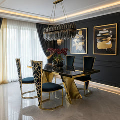 Ravello 160cm black marble dining table set with Vienna chairs, combining high-gloss marble and polished gold detailing for luxury UK dining rooms.
