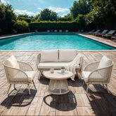 Cove 4 seater garden lounge set with natural polyrattan finish for stylish outdoor seating in UK gardens and patios.