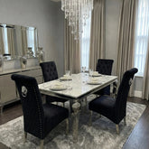 Modern grey marble dining table paired with elegant lion knocker chairs for contemporary homes