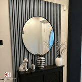 Light grey multi-width slatted feature wall