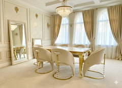 Elegant cream gold marble dining table with upholstered Vegas dining chairs creating a premium dining room interior in Surrey, Essex and Hertfordshire homes