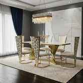 Cream marble dining table with polished gold pedestal and Vienna seating for sophisticated London apartments