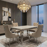Sofia cream marble dining table with Majestic Lion Knocker Chairs for luxury UK dining rooms