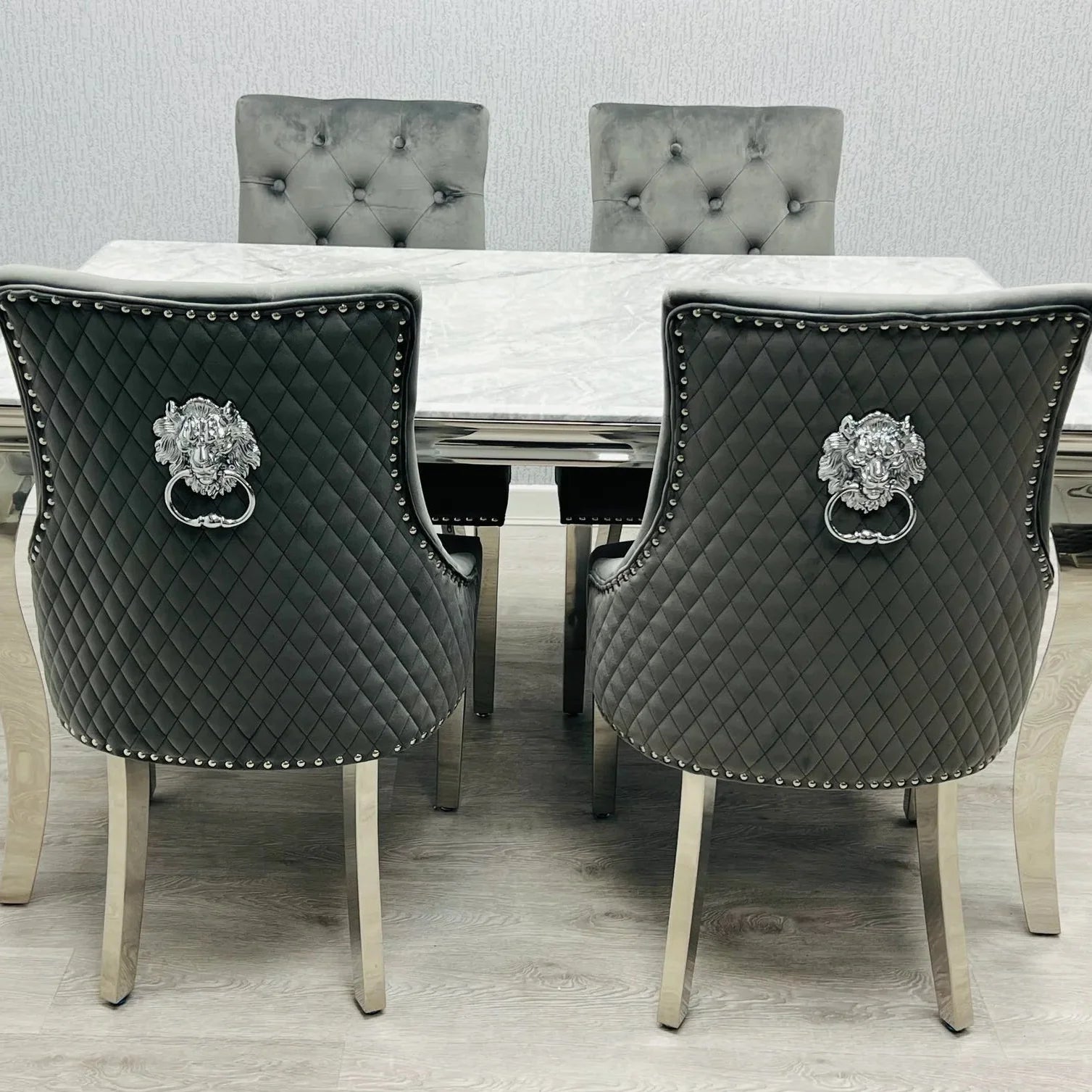 Sofia grey marble dining table with Majestic Grey Lion Knocker Chairs for luxury dining rooms in London, perfect for contemporary family homes.