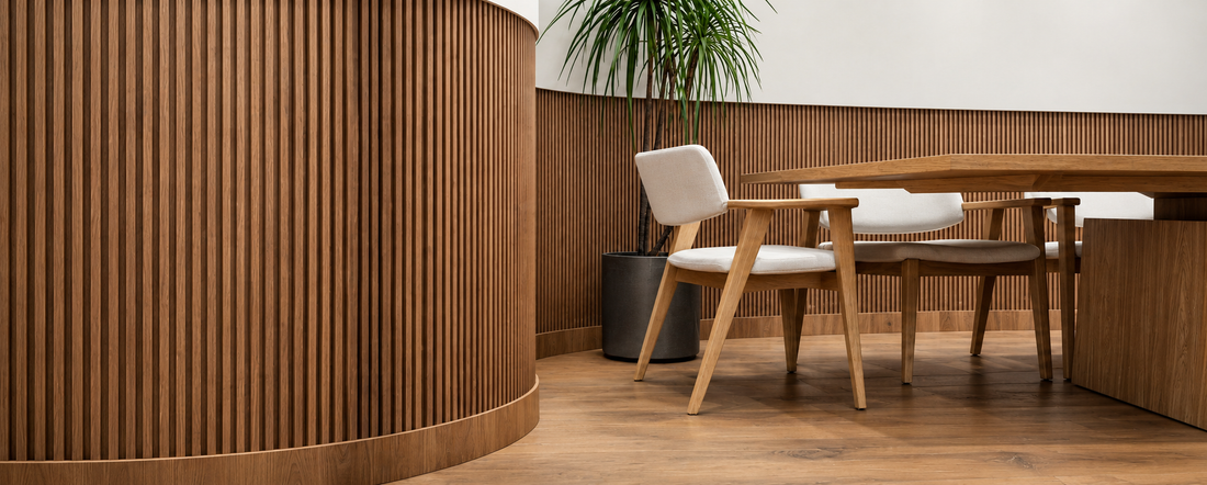 Flexible walnut slat wall panels installed on curved wall