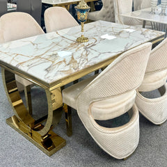 Ariana 180cm white and gold marble dining table with Santo chairs for sophisticated London dining rooms, combining high-gloss marble with a polished gold pedestal.