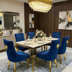 Sofia Cream Gold Marble Dining Table with Majestic Gold Lion Knocker Chairs creating a grand luxury dining atmosphere for London luxury apartments and premium homes.