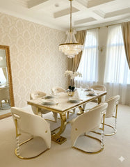 Ariana 160cm gold marble dining table with Vegas chairs, featuring a polished geometric pedestal and high-gloss finish for elegant London dining rooms.
