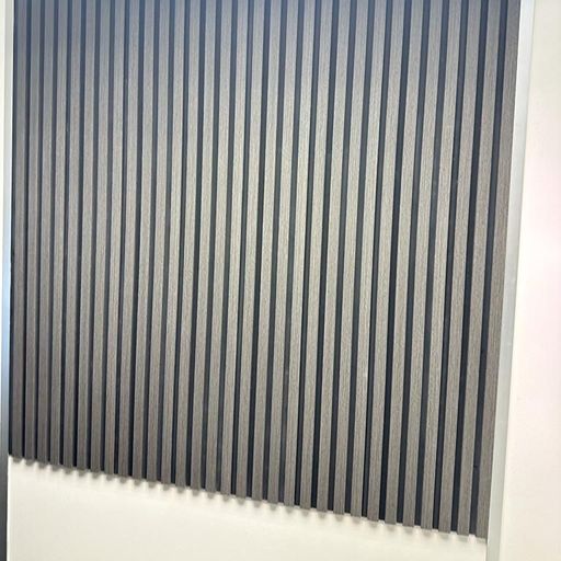 Ash Grey WPC slatted wall cladding in a home office
