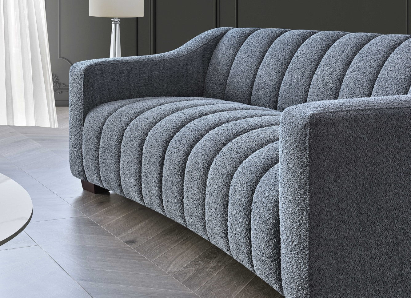 Iron bouclé sofa with Chesterfield-inspired design