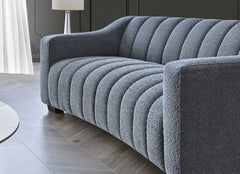 Iron bouclé sofa with Chesterfield-inspired design