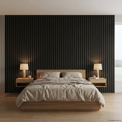 Black vertical acoustic slat panels used as a bedroom feature wall
