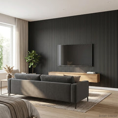 Black acoustic slat wall panels creating a feature wall in a media room