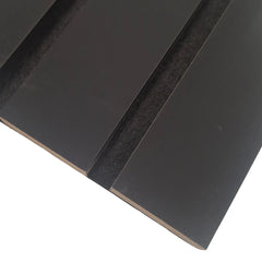 Close-up of black wide slat acoustic wall panel