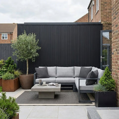 Black composite wall cladding panels for outdoor exterior walls