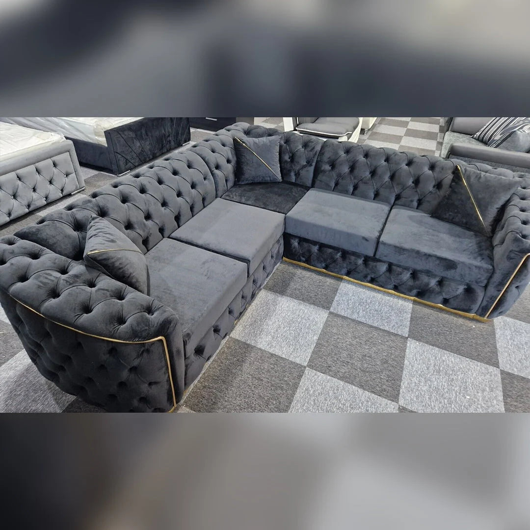 Black luxury corner sofa with gold detailing