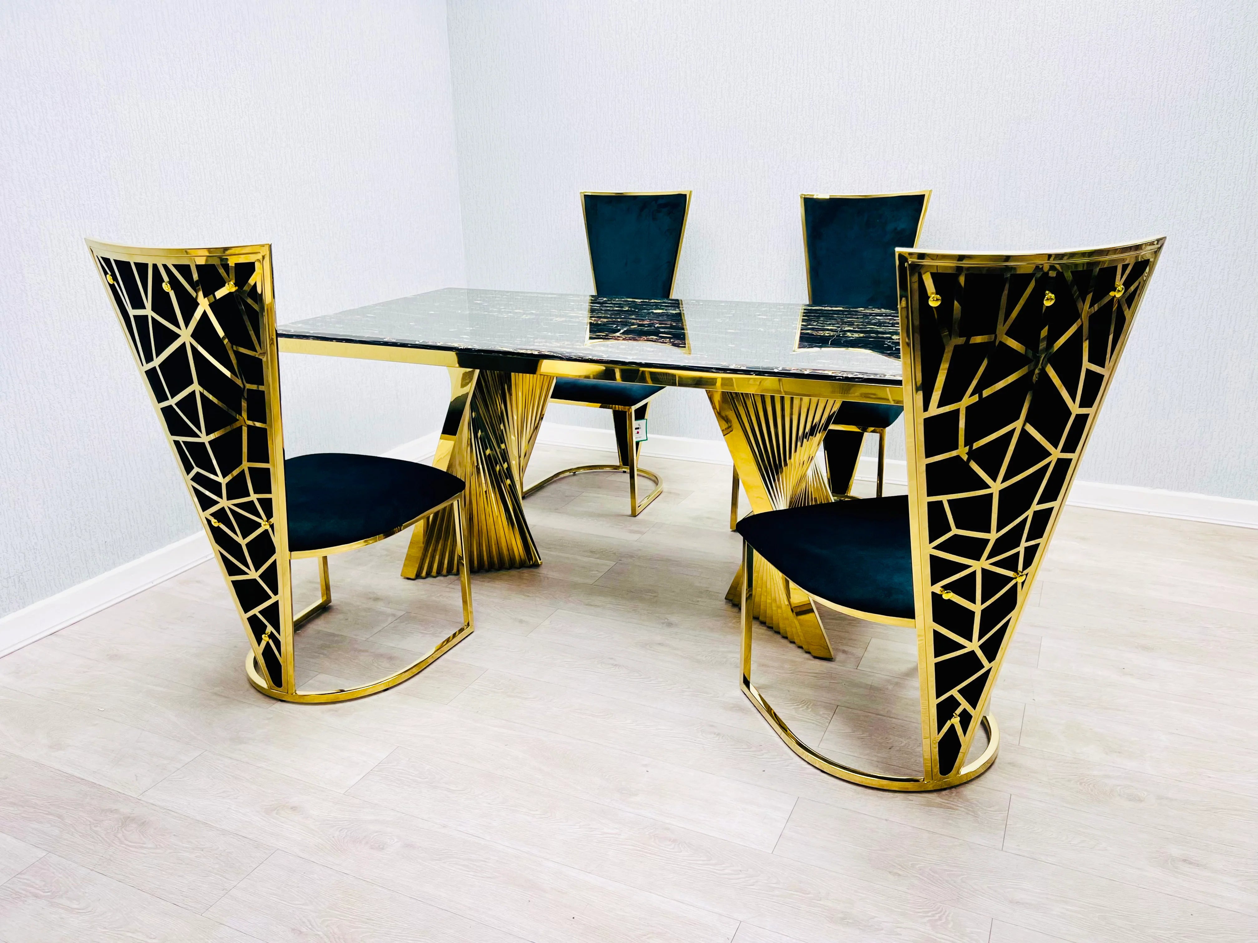 Premium black and gold marble dining set with elegant Vienna chairs, ideal for sophisticated London apartments seeking designer style and quality furniture.