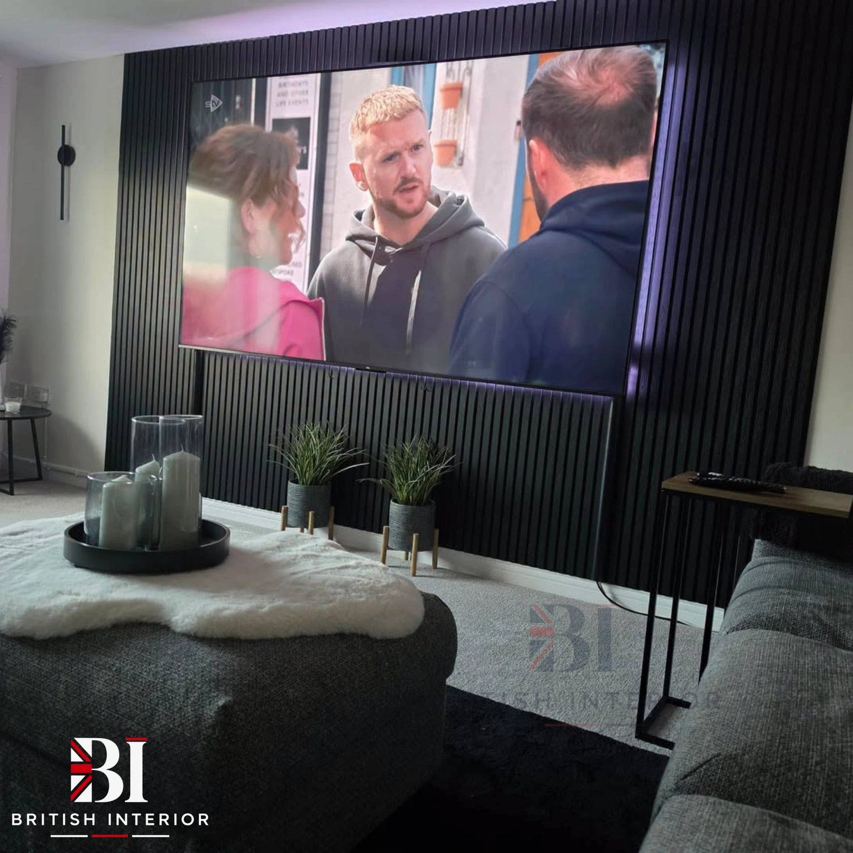 Black slatted acoustic feature wall