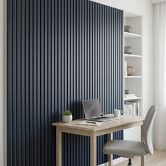 Blue acoustic slat wall panels installed in a modern office interior