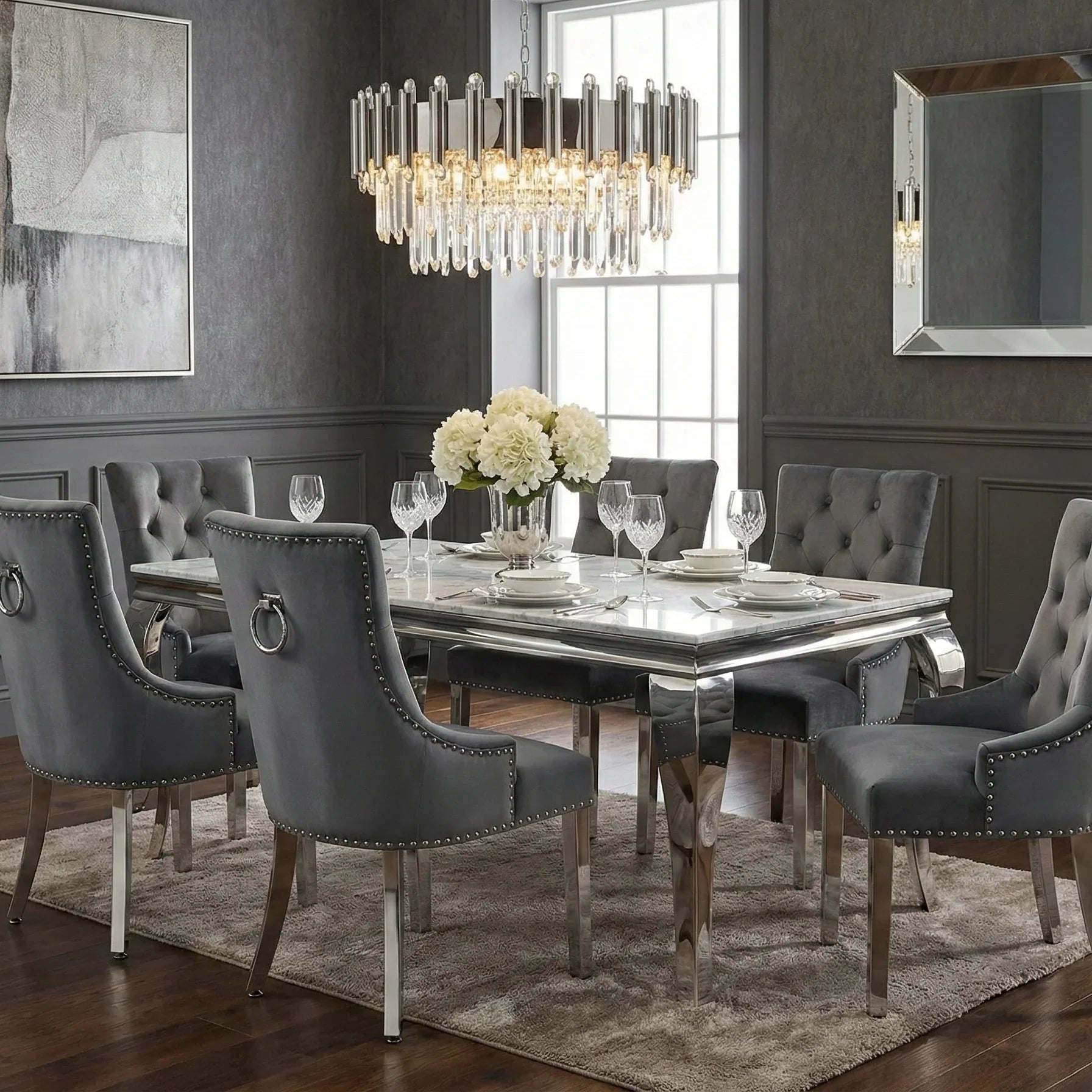Transform your London dining room with the British Interior Sofia Grey Marble Dining Table and Valencia Ring Knocker Chairs, a luxury dining set designed for elegant family living and sophisticated entertaining.