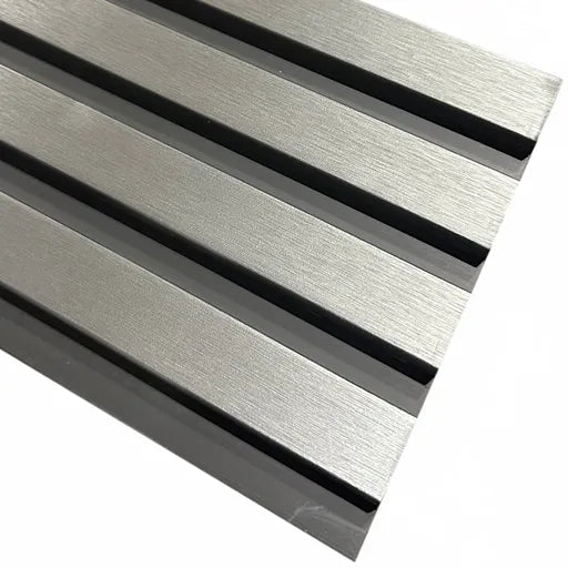 Close-up of chrome and black slatted WPC wall panel finish