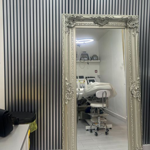 Chrome and black WPC slatted wall panels with wood-effect finish