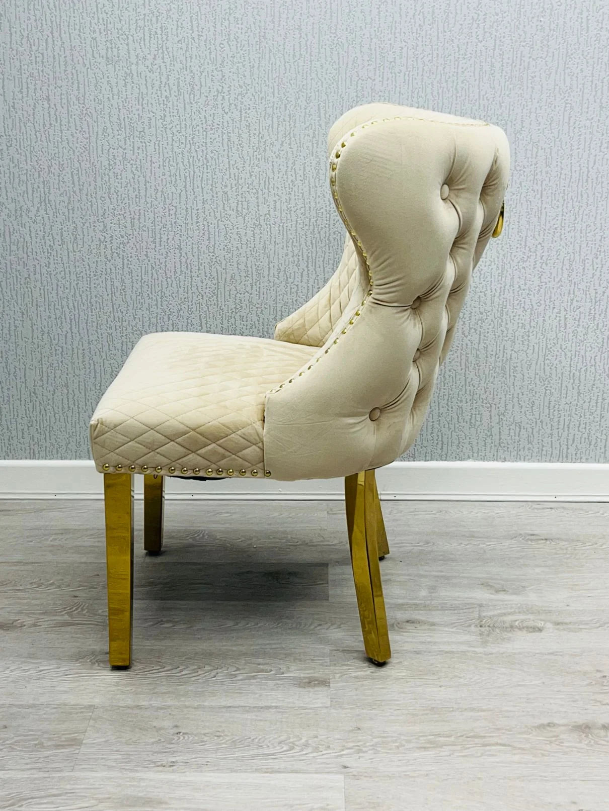 Cream marble-effect and gold dining chairwith Valentino Chairs, creating an inviting setting for dinner parties, celebrations and memorable evenings with guests.