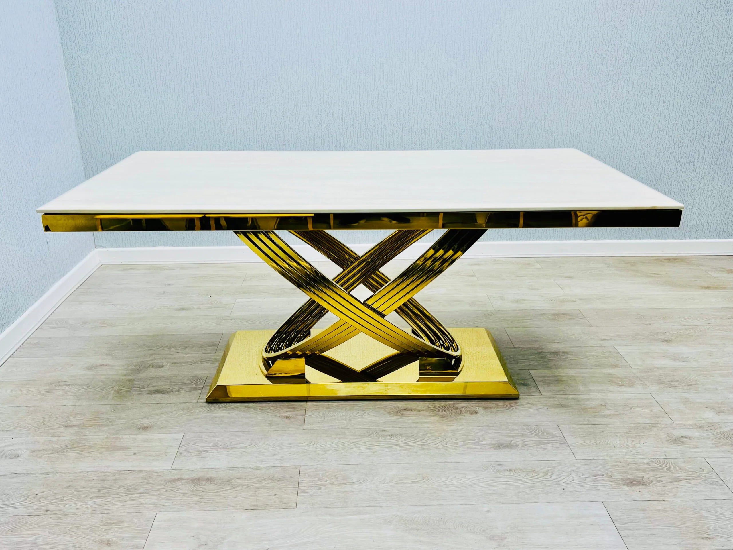 Cream and gold marble tabletop forming a striking statement dining table for sophisticated UK homes