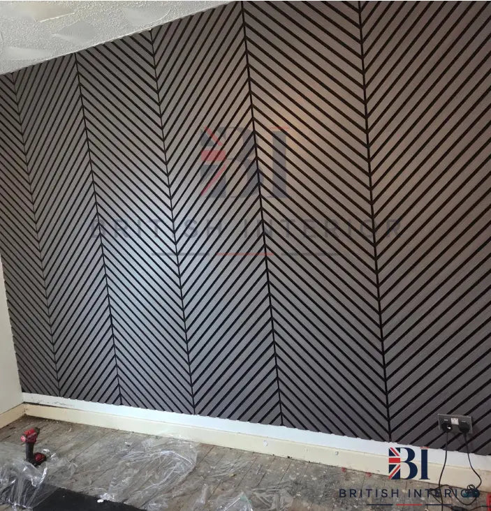 Customer installation of acoustic slatted wall panels on a living room feature wall from British Interior