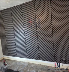 Customer installation of acoustic slatted wall panels on a living room feature wall from British Interior