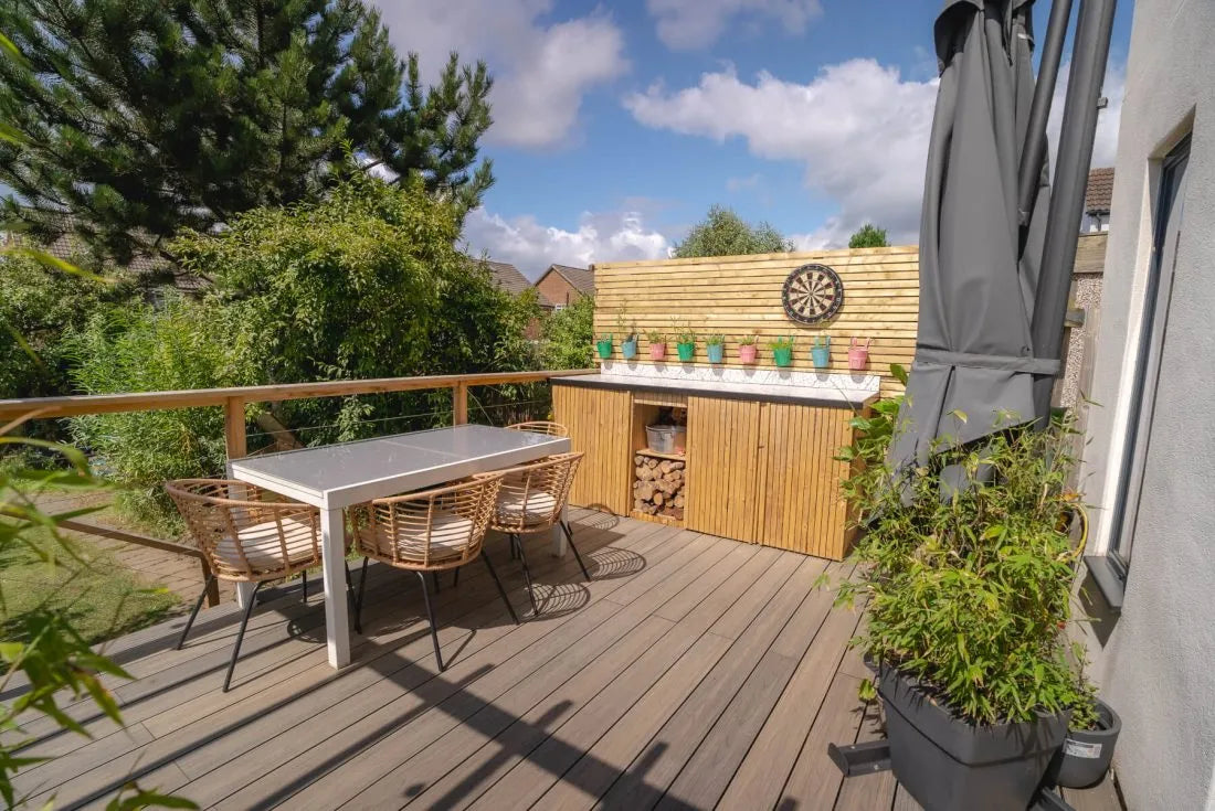 Dark brown composite decking creating an outdoor living area