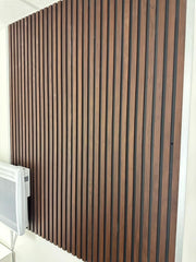 Dark Oak slatted wall cladding used on a modern interior wall