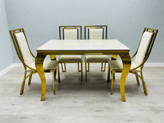 Contemporary cream marble dining set with luxury Windsor chairs, ideal for stylish homes and executive properties in Surrey.