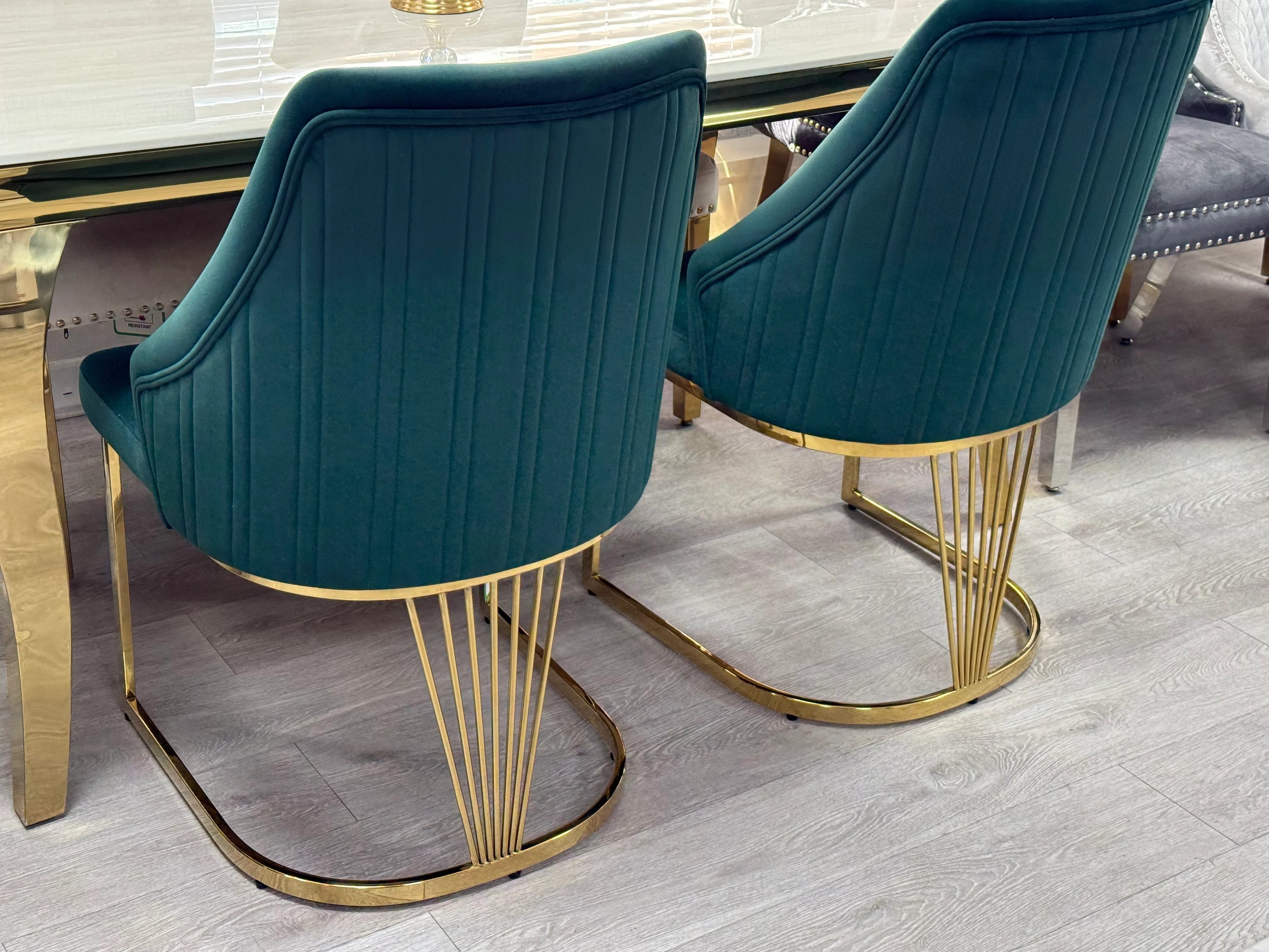 Elina 6 or 8 seateror marble dining table with Lasco Gold Chairs, combining spacious 6–8 person seating, sophisticated design and quality finishes for Nottingham homes.