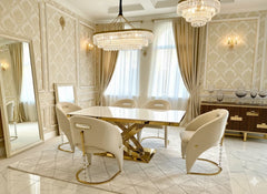 Elegant Elina gold marble dining table with upholstered Vegas chairs for a sophisticated modern dining room