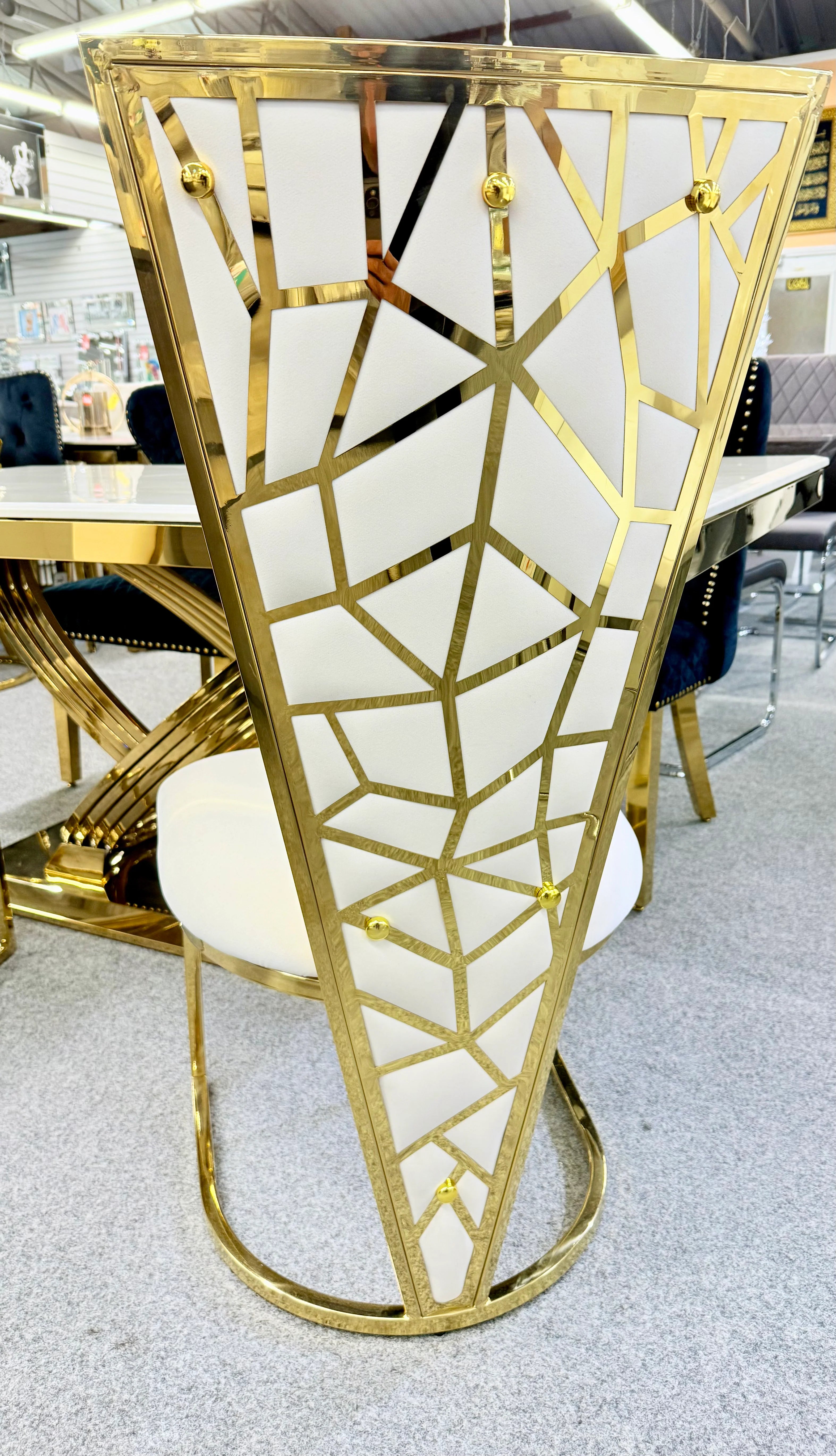 Elegant Vienna cream dining chairs providing refined seating for luxury marble dining rooms