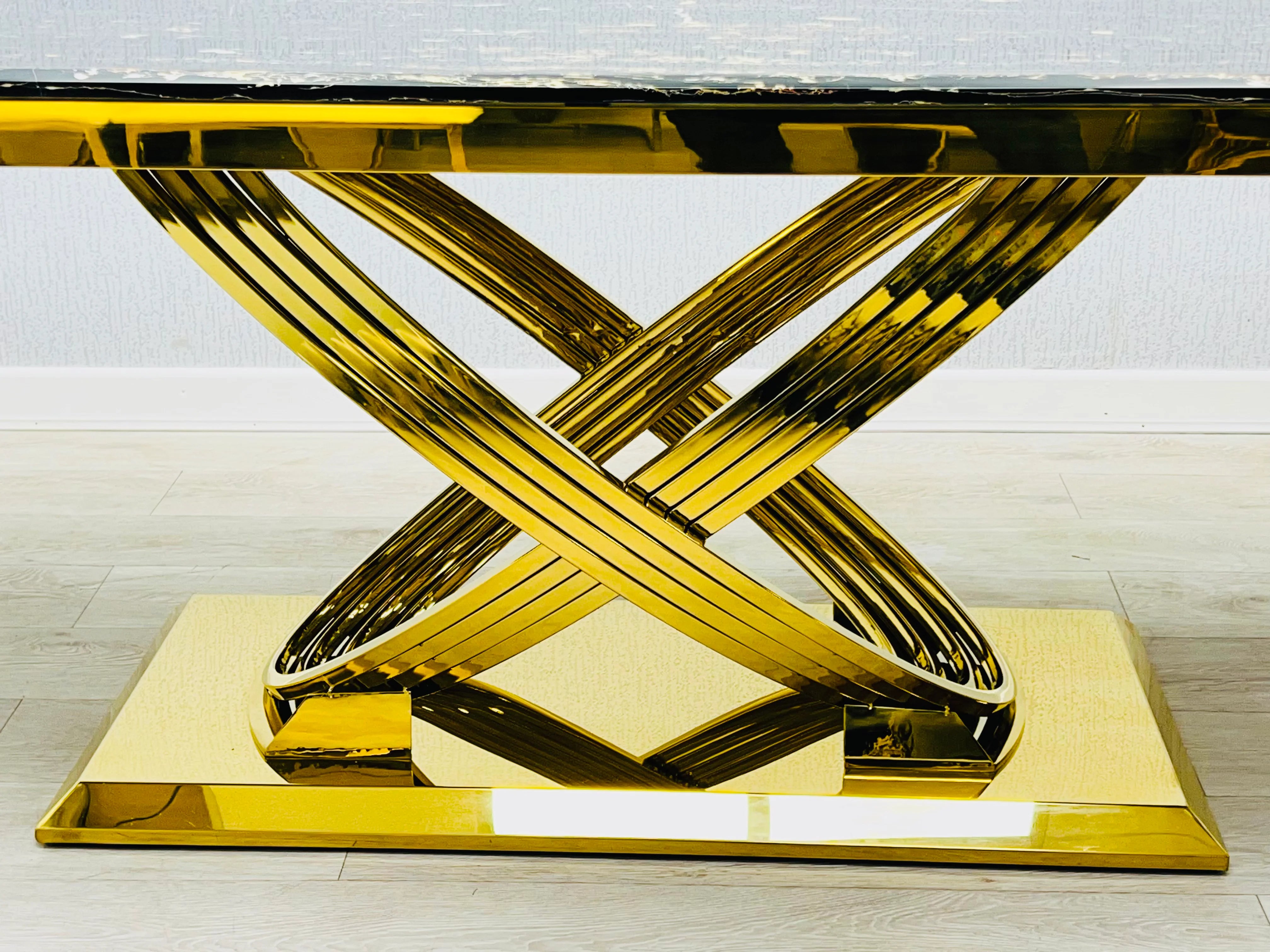 Statement cream marble dining furniture with sculptural gold pedestal and Valentino Gold Chairs, designed for Sheffield homeowners creating an elegant contemporary dining room.