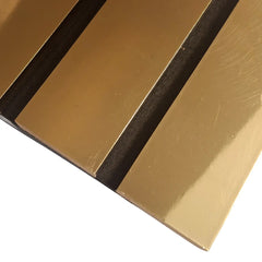 Close-up of gold WIDE slats showing the textured finish and detailed surface
