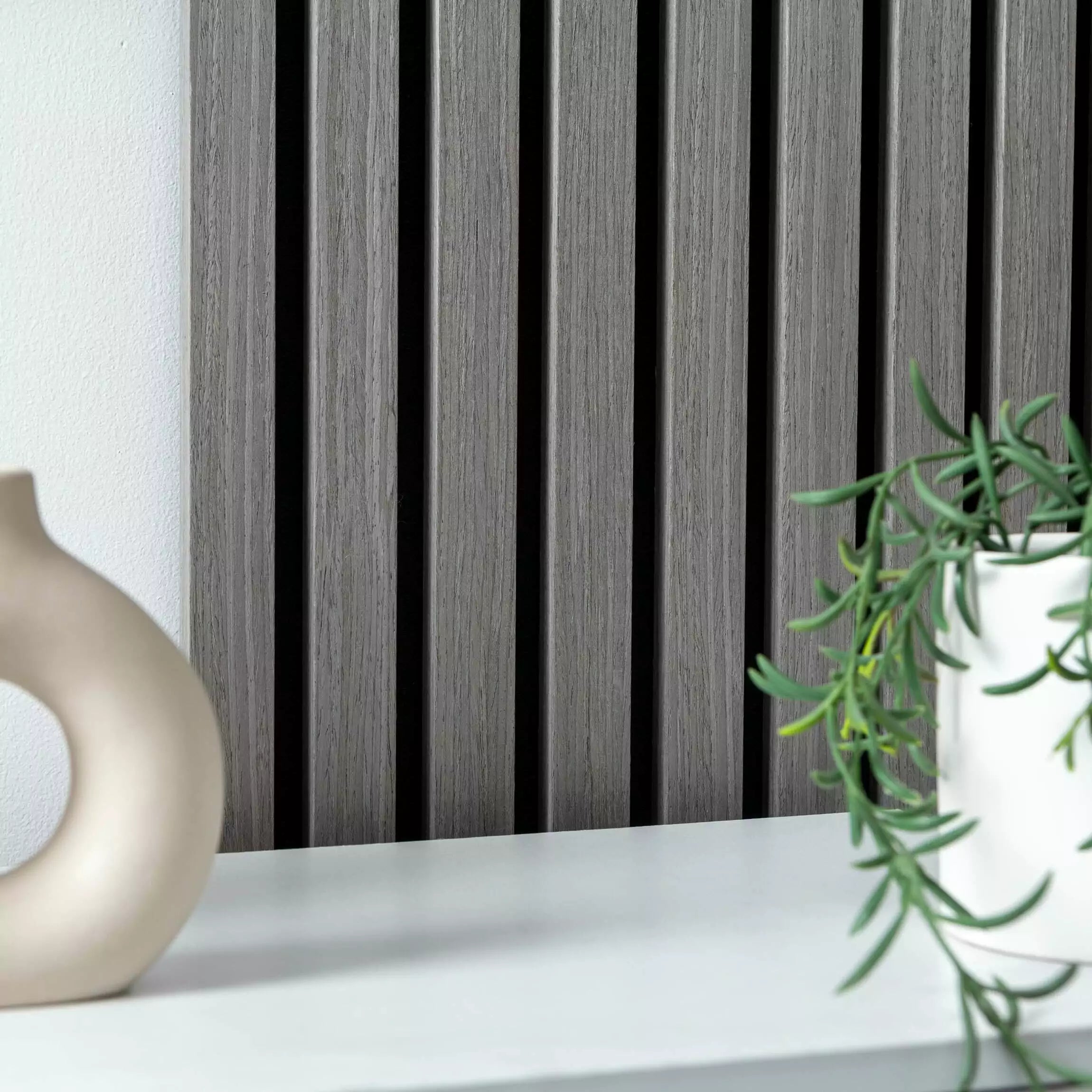 Close-up of Grey Oak acoustic wall panel slats