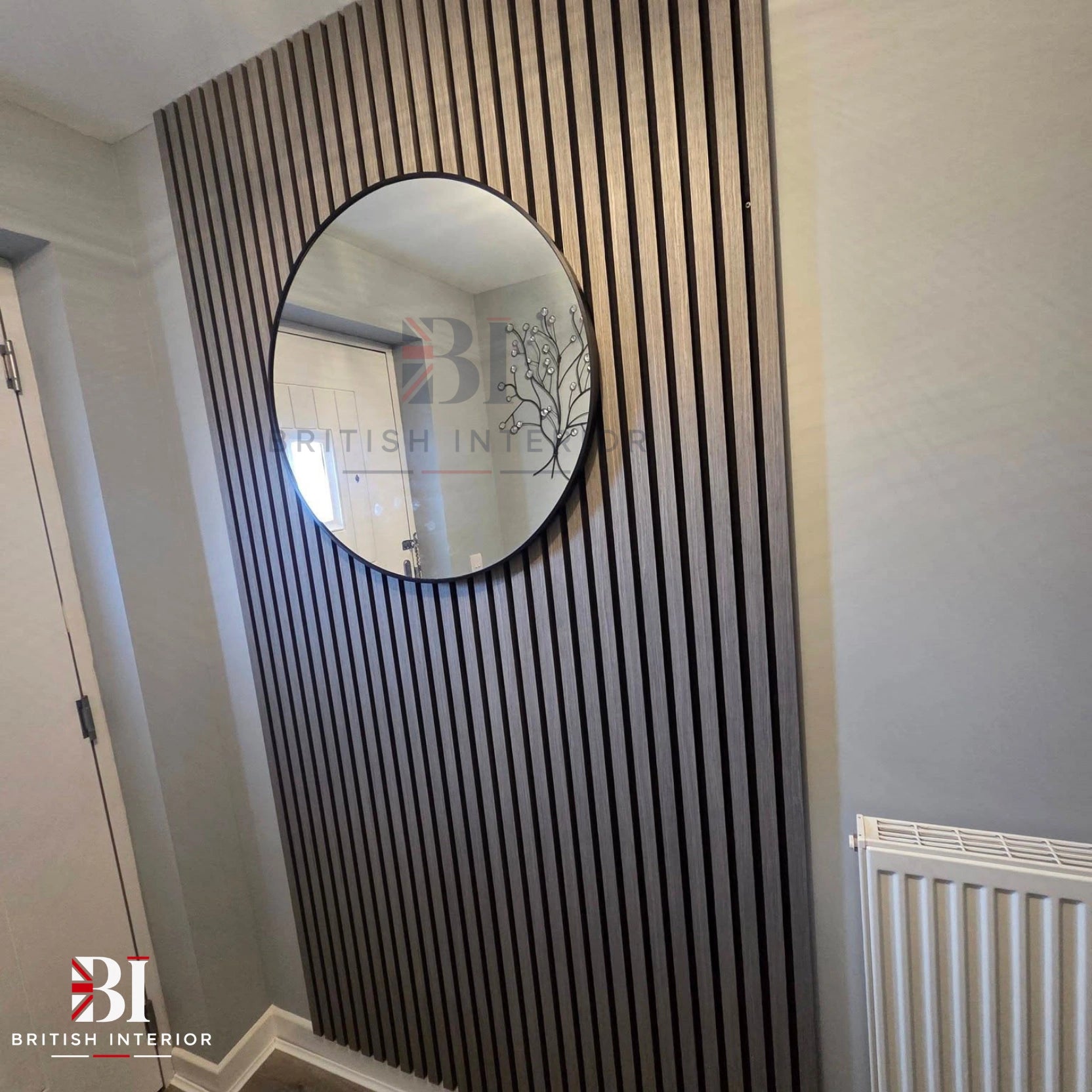Grey oak vertical wall panels paired with a plain white interior wall