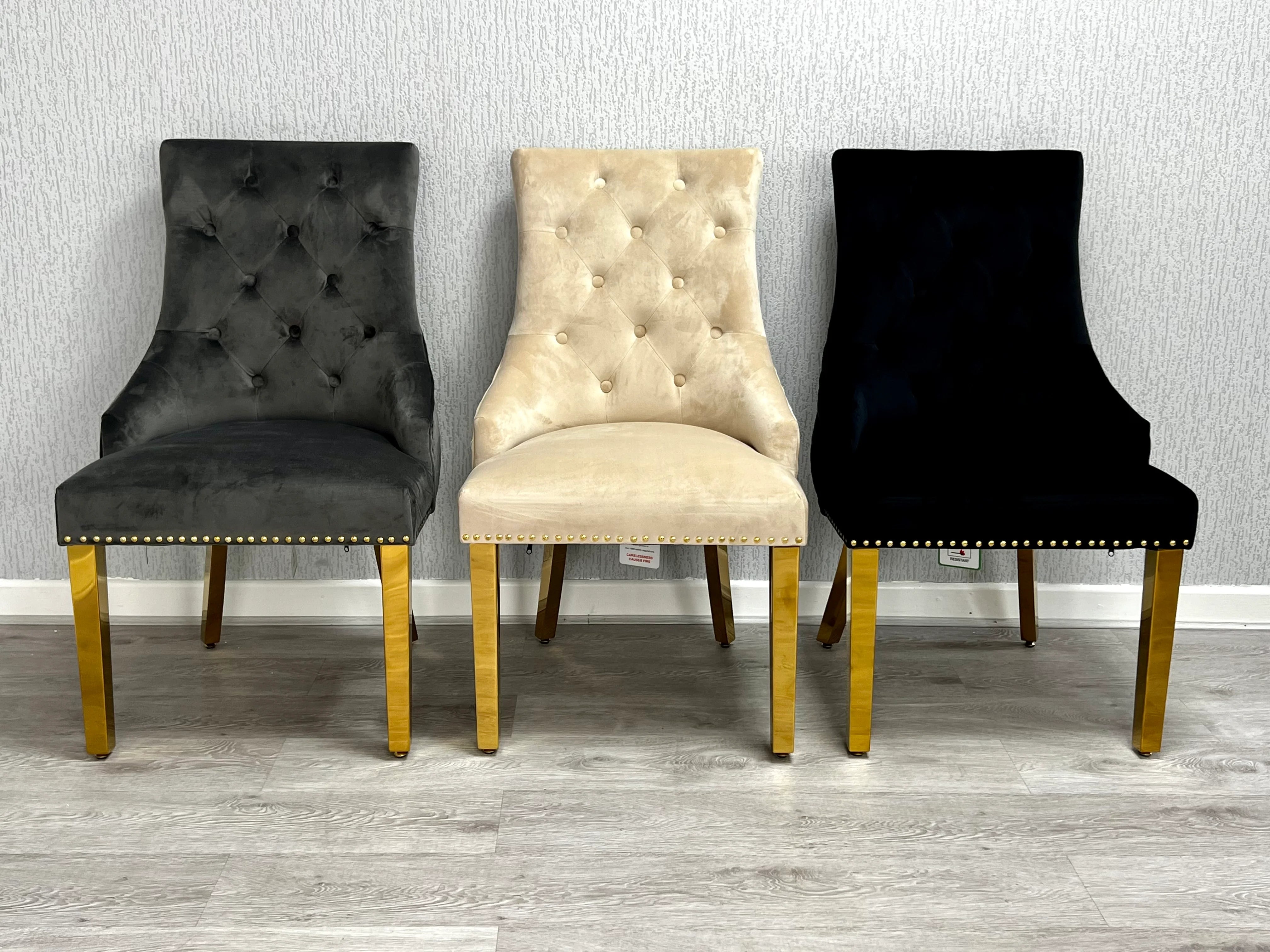 A designer dining centrepiece for Cardiff interiors featuring luxury marble finishes, plush seating, and elegant gold detailing.