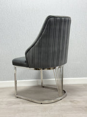 Premium dining furniture featuring a grey marble tabletop and Lasco Grey chairs for luxury Newcastle homes.