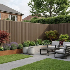 Light brown composite wall cladding used for a modern fencing feature