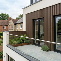 Light brown WPC exterior wall cladding with timber-effect finish