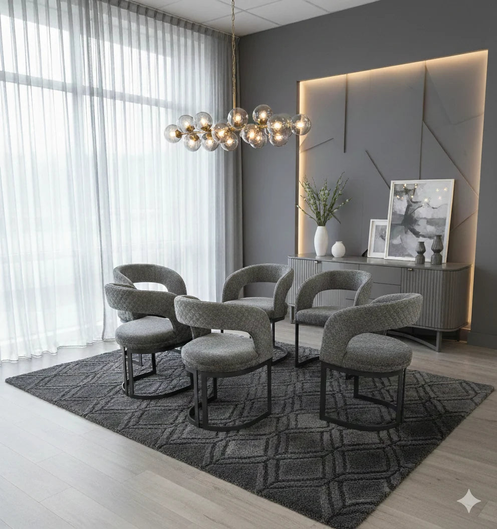 Contemporary grey upholstered dining chairs designed to complement luxury marble furniture