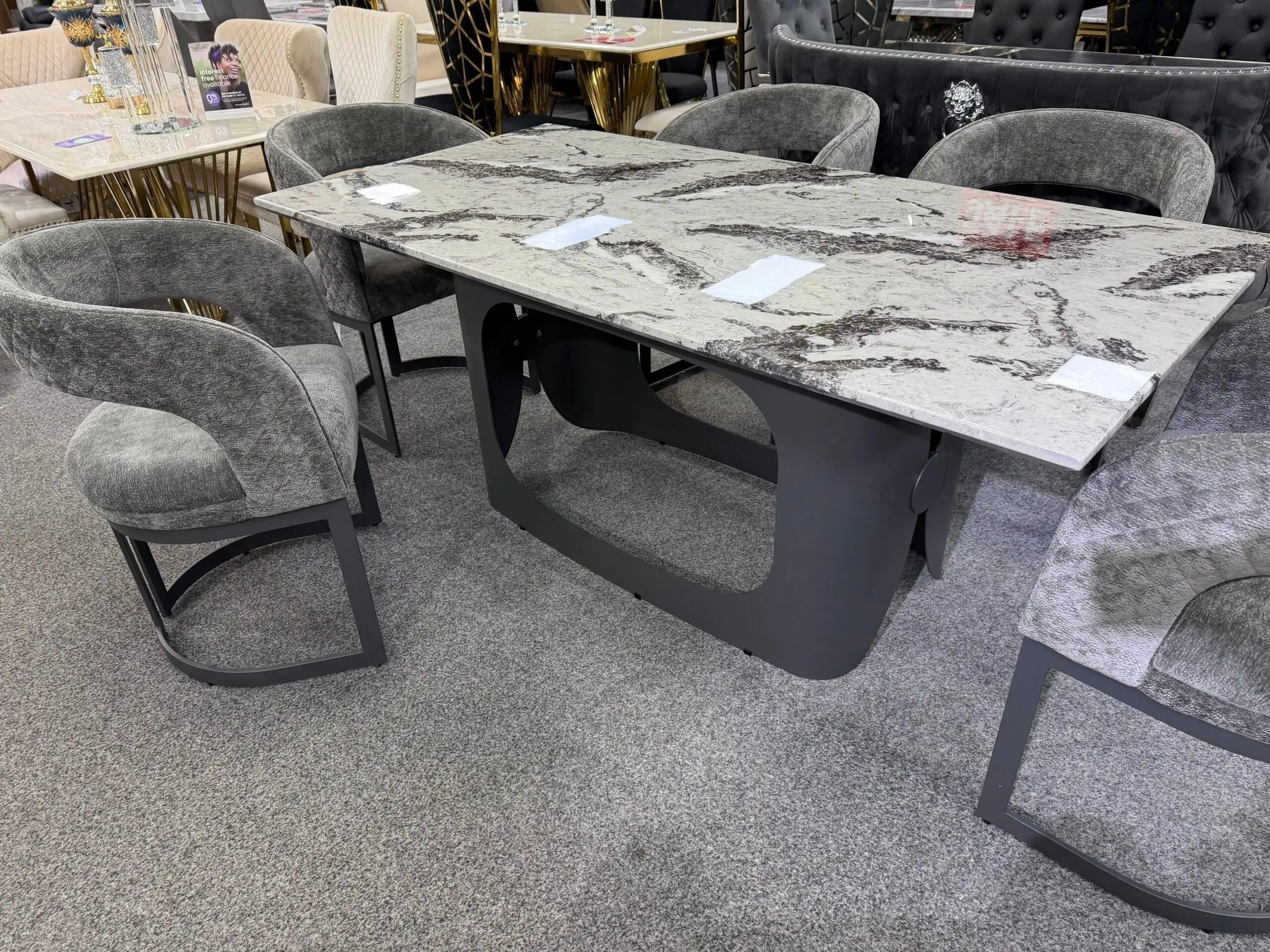 Contemporary marble dining table and upholstered seating for refined homes in Bristol and Bath