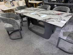 Contemporary marble dining table and upholstered seating for refined homes in Bristol and Bath