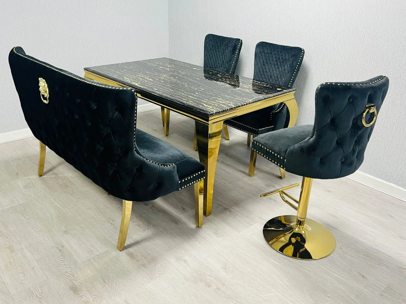 Transform Birmingham dining rooms with this bold black and gold marble furniture set designed for homeowners seeking modern luxury interior styling.