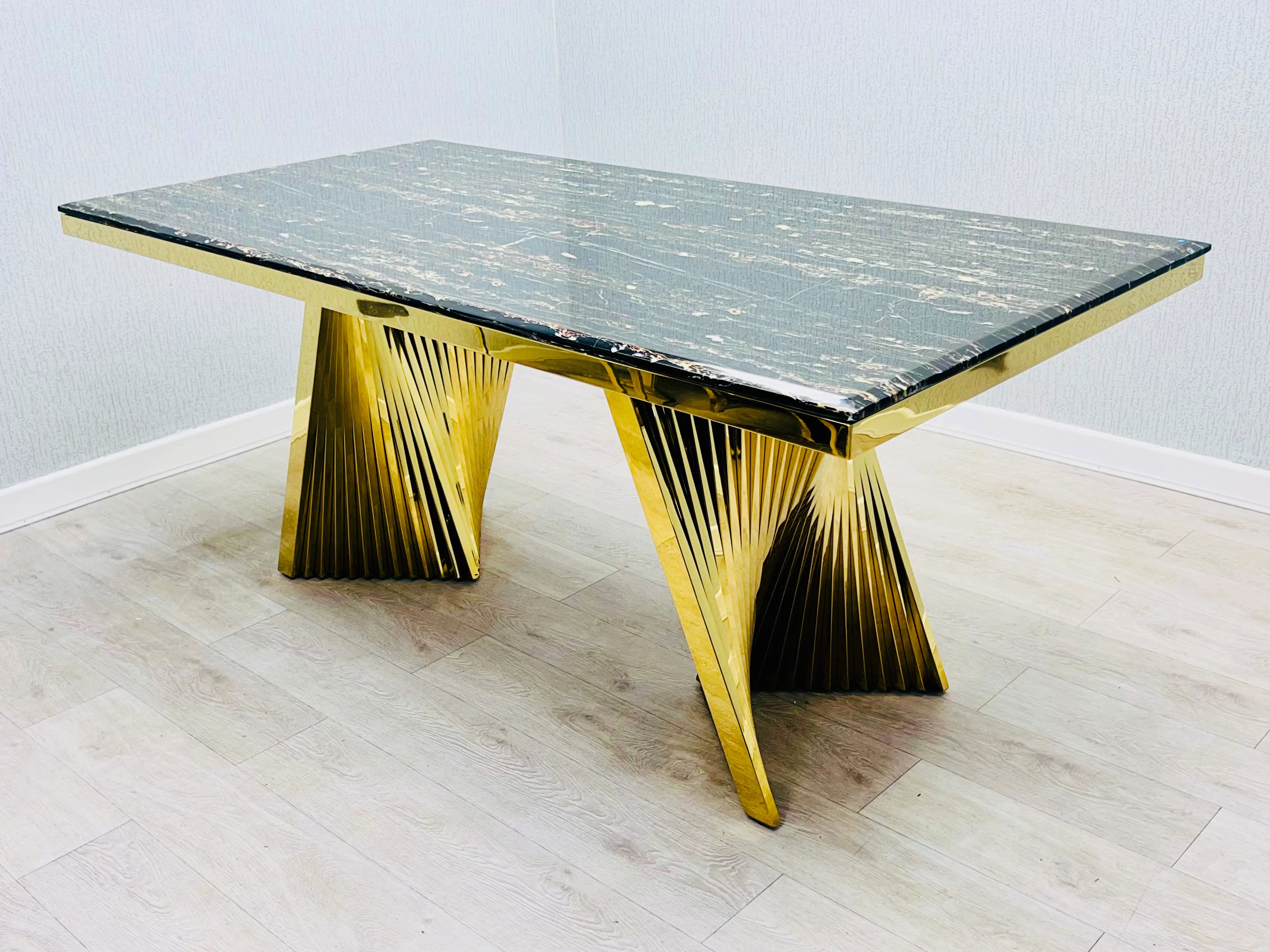 Luxury black marble dining table and chairs for contemporary interiors