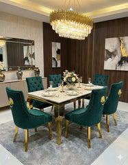 A statement dining suite for Birmingham homeowners seeking opulent interior décor, combining elegant marble craftsmanship with gold-inspired detailing.